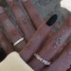 Sterling silver ring with 4mm width and ribbed detail