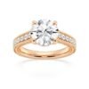 Engagement ring with classic round shape and hidden halo