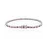 Ruby and diamond tennis bracelet with a refined alternating design