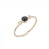 Ring with thick gold plating and a round sapphire
