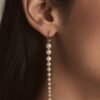 Pearl and premium CZ diamond drop earrings with a graduated design