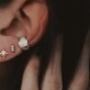 Gold-plated sterling silver star stud earrings with a delicate finish