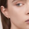 Sterling silver hoop earrings with a bold talon-inspired design and 12mm drop
