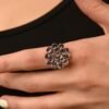 Cluster ring with tanzanite stones and a premium CZ diamond accent