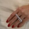 Two finger ring with premium CZ diamond accents and pave setting