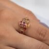 Ring with oval sapphire stones in bezel settings